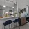 a kitchen with a table and chairs