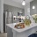 a kitchen with a table and chairs