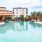 a swimming pool with a building in the background