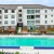 a pool in front of a building