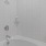 a bathroom with a bathtub and a basket