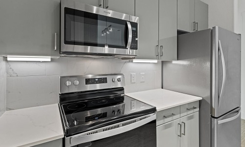 a kitchen with stainless steel appliances