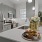 a kitchen with a table and chairs