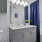 a bathroom with a tub sink and toilet