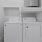 a washing machine and dryer in a closet